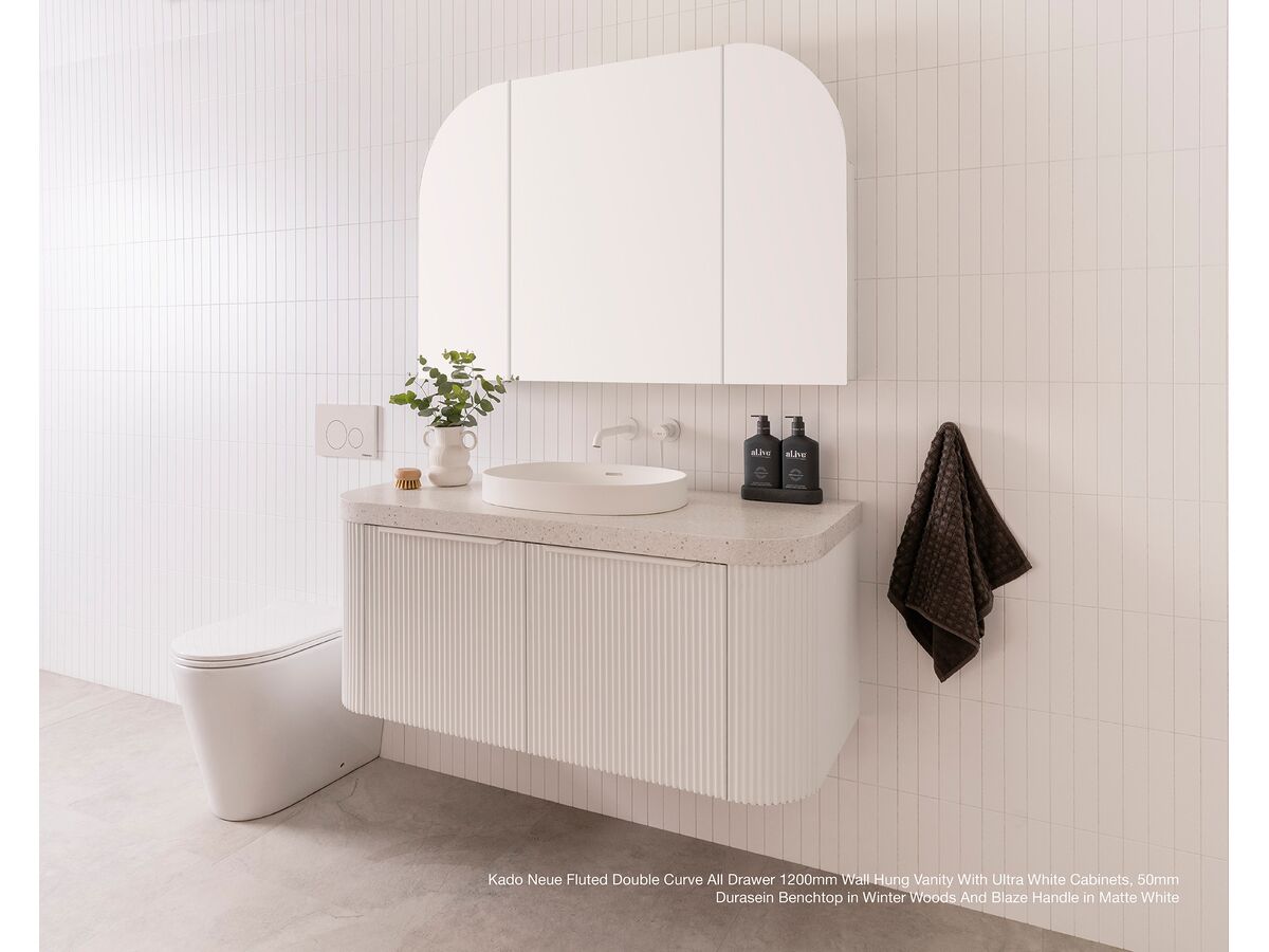 Kado Neue Fluted Double Curve All Drawer 1200mm Wall Hung vanity with Ultra White cabinets, 50mm Durasein benchtop in Winter Woods and Blaze handle in Matte White