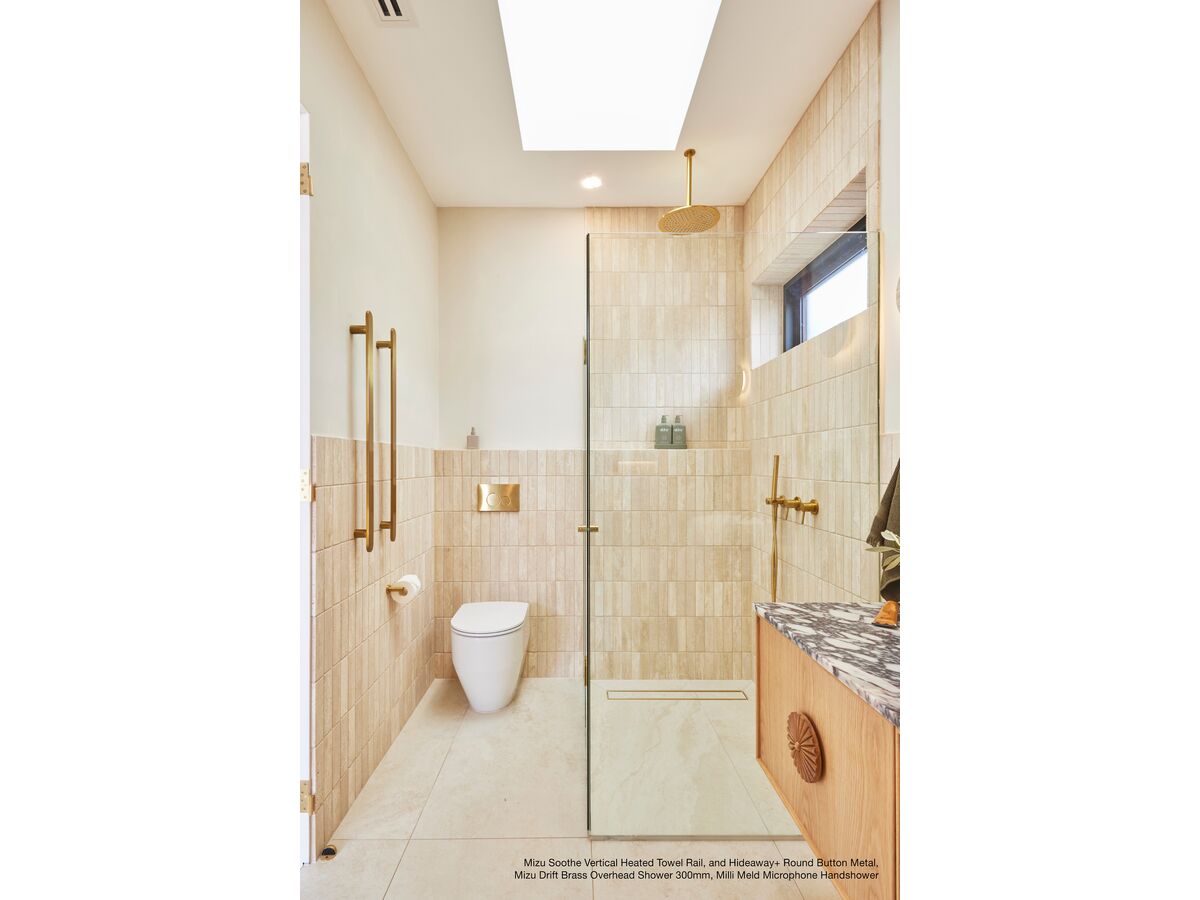 In Situ - Mizu Drift Brass Overhead Shower 300mm Brushed Gold, Mizu Soothe Vertical Heated Towel Rail Brushed Gold, Milli Meld Microphone Handshower Brushed Gold, Mizu Drift MK2 Shower Mixer in Brushed Gold and Hideaway+ Round Button Metal in Brushed Gold