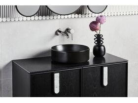 In Situ - Adorn 1 vanity with Carrara Tulip handle and Blossom shaving cabinet landscape top side view - Charcoal Oak